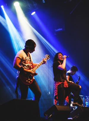 Musicians on stage with lights