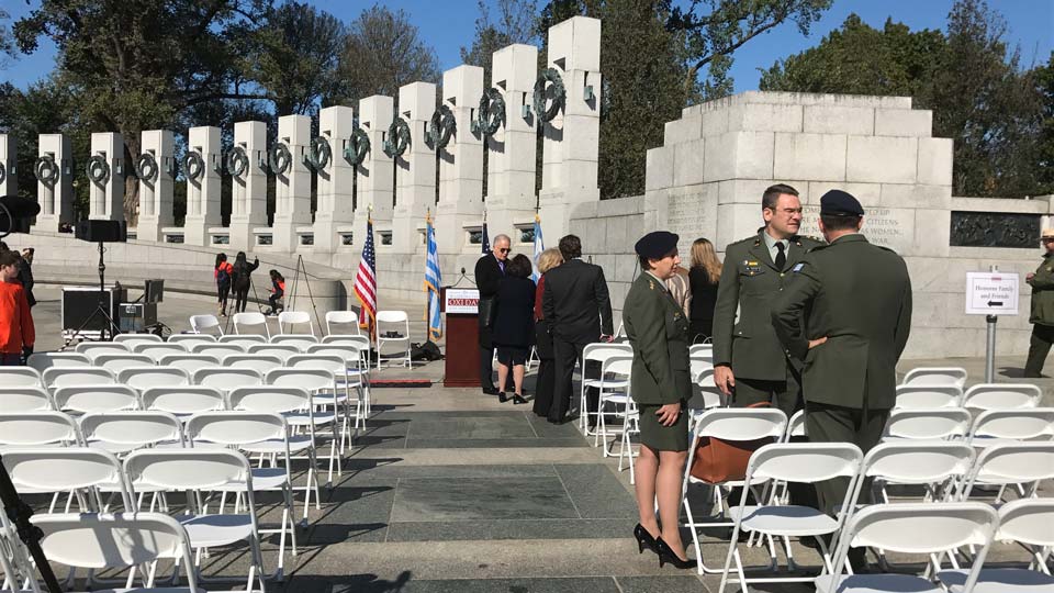 Filming an event at the World War II Memorial on the mall